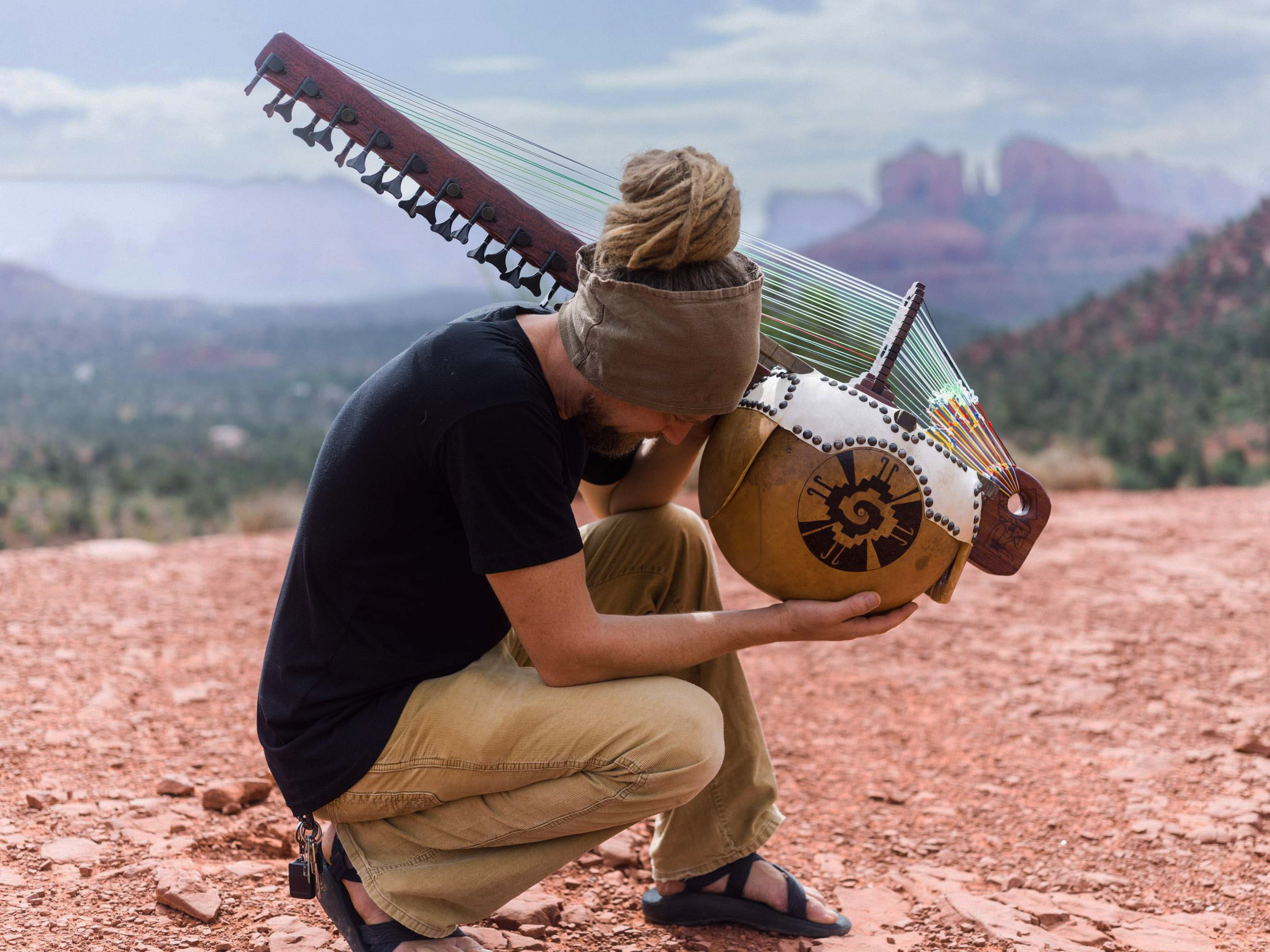 Bryan Vallone holding Quetzalcoatl Kora